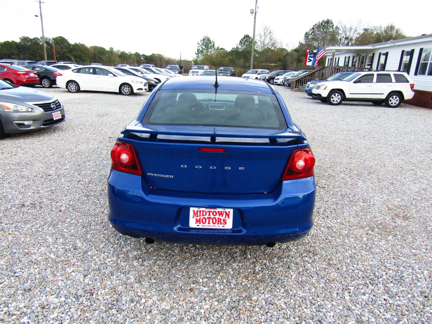 2012 Blue Dodge Avenger SE (1C3CDZAG6CN) with an 3.6L V6 DOHC 24V FFV engine, Automatic transmission, located at 15016 S Hwy 231, Midland City, AL, 36350, (334) 983-3001, 31.306210, -85.495277 - Photo#6